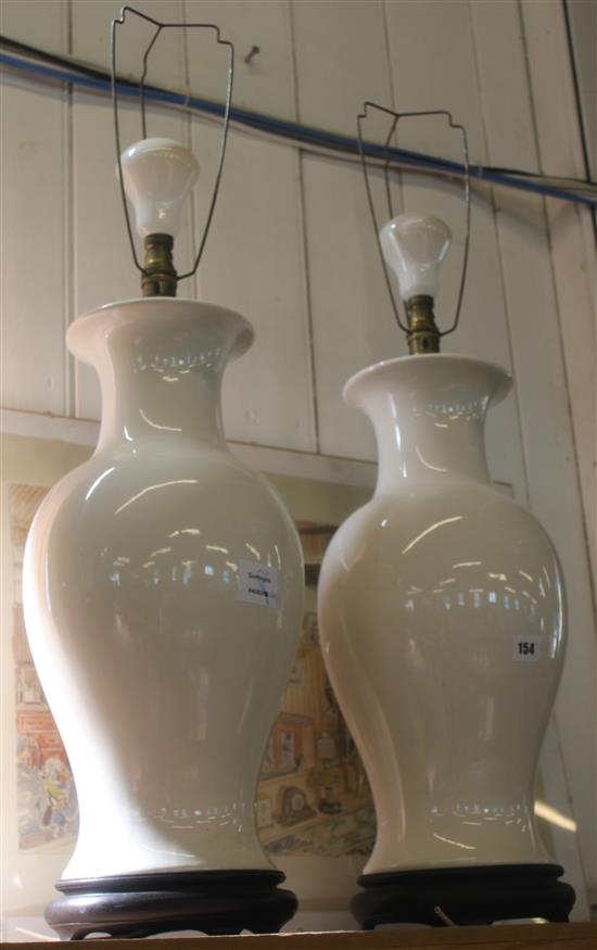 Pair of white glazed bulbous table lamps